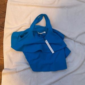 Blue crisscross top in perfect condition small